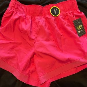 Brad new women’s running shorts. NWT! Size medium. Hot pink.